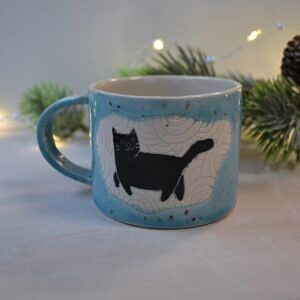 Kubek z czarnym kotem